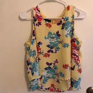 Yellow floral tank top.